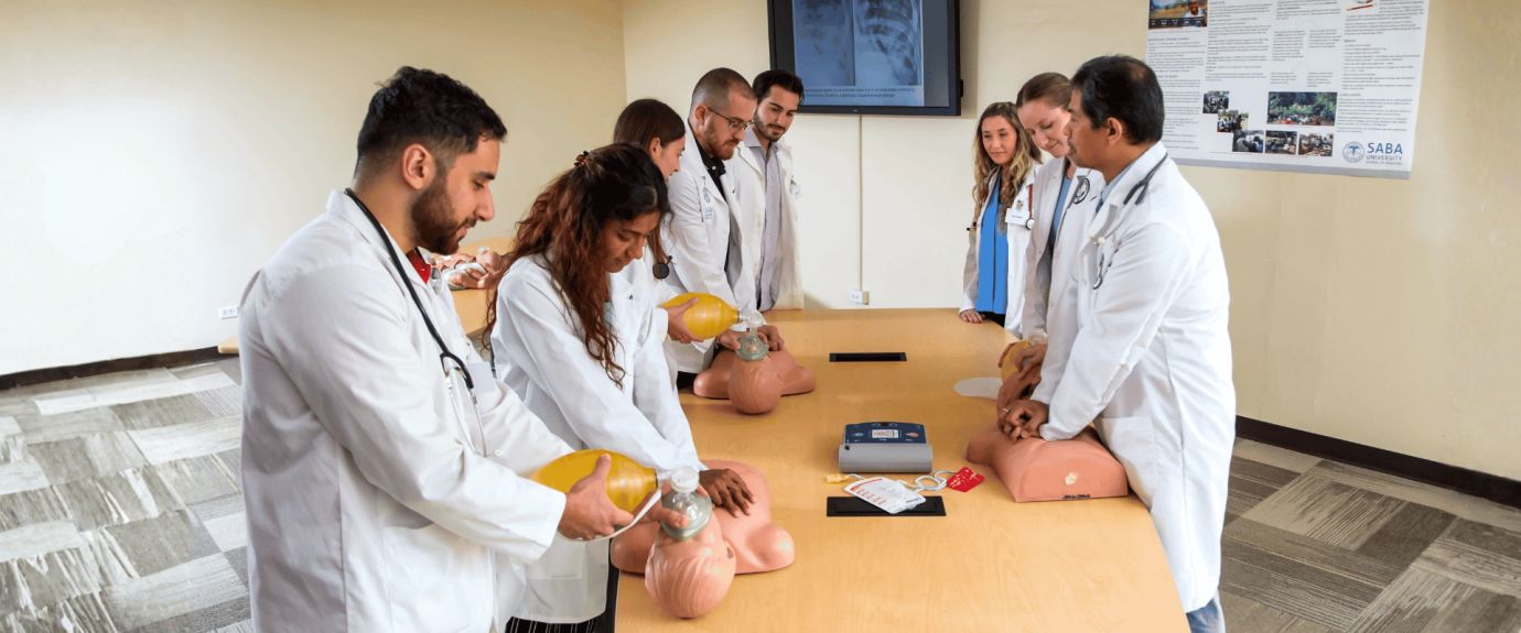Group of medical students practicing CPR