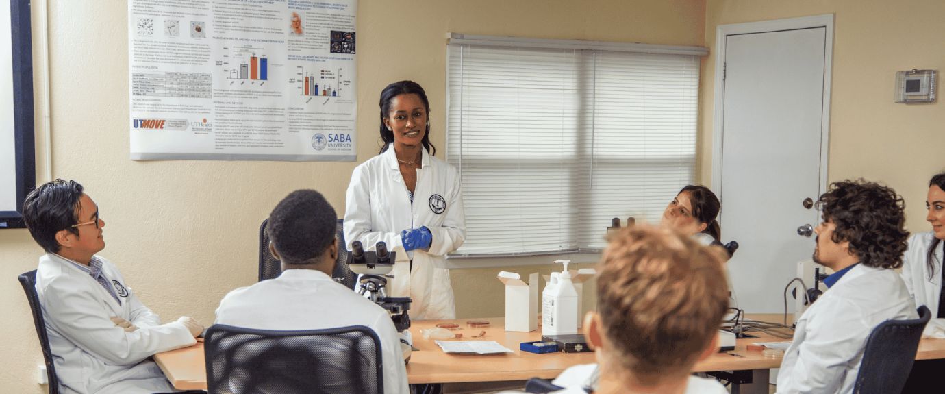 Female student presenting to a class