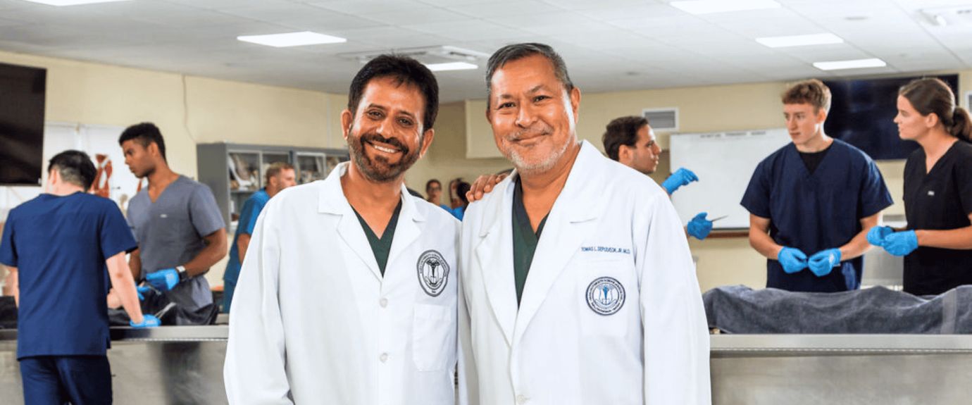Two faculty members in the anatomy lab