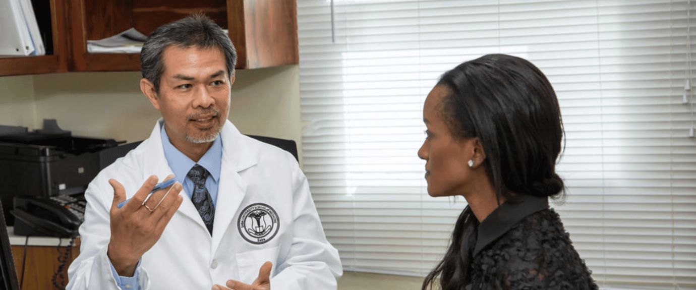 Professor talking to a medical student