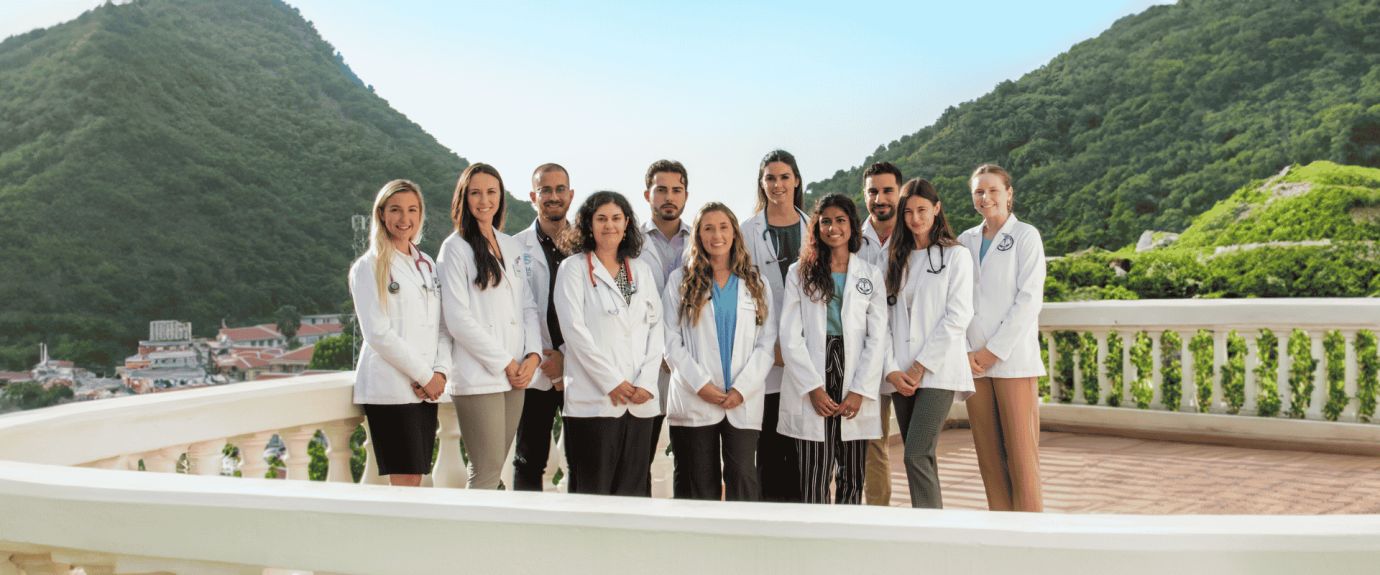 Group of medical students in white coats